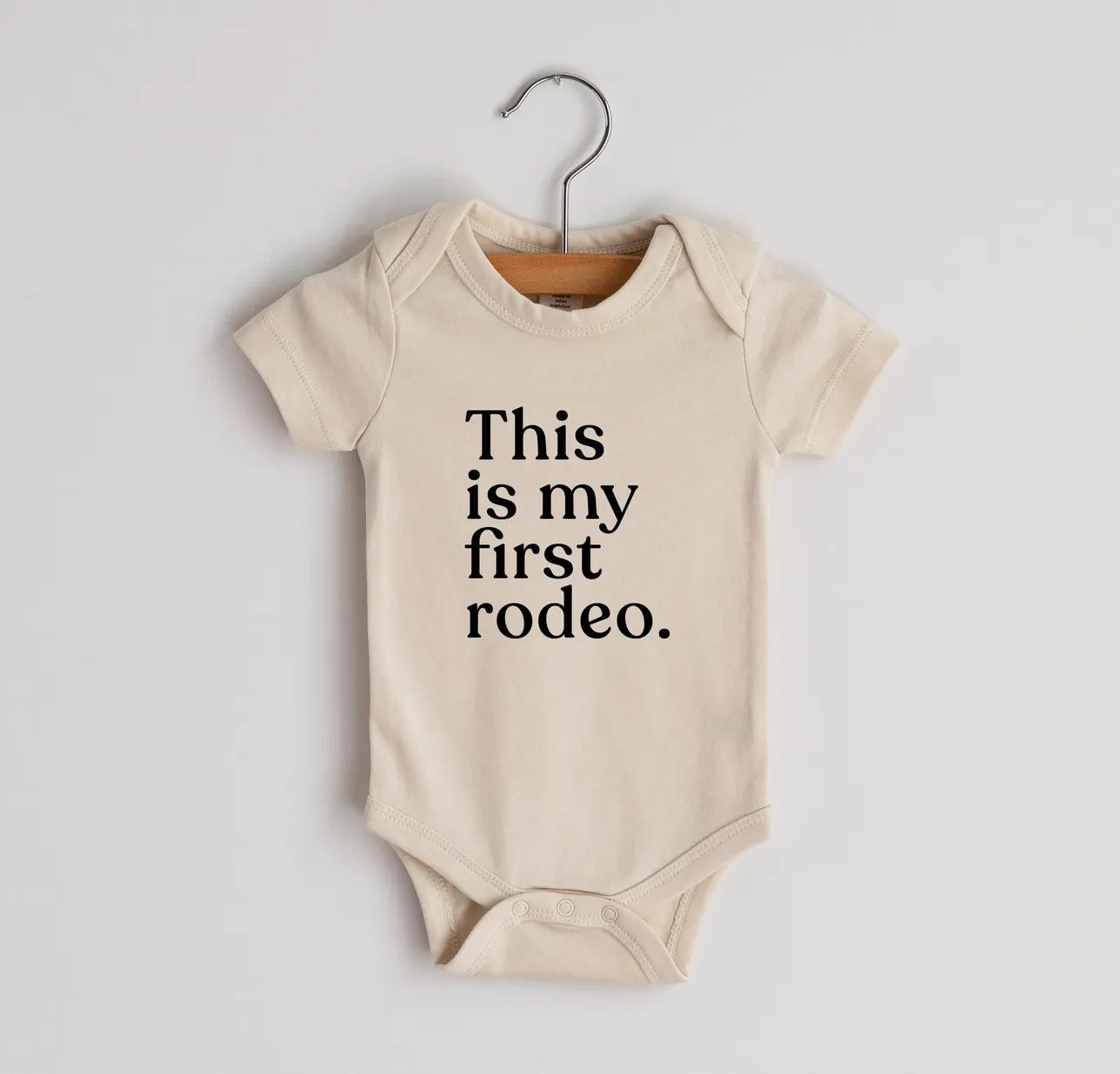 Gladfolk This Is My First Rodeo Baby Bodysuit - Cream