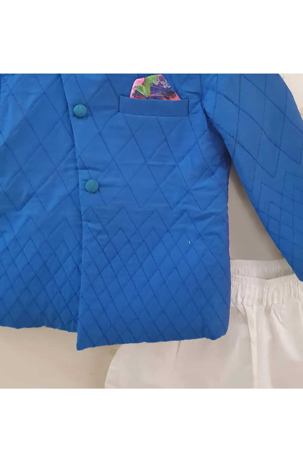 Pintucked quilted turquoise blue jacket and jodhpuri pyjama